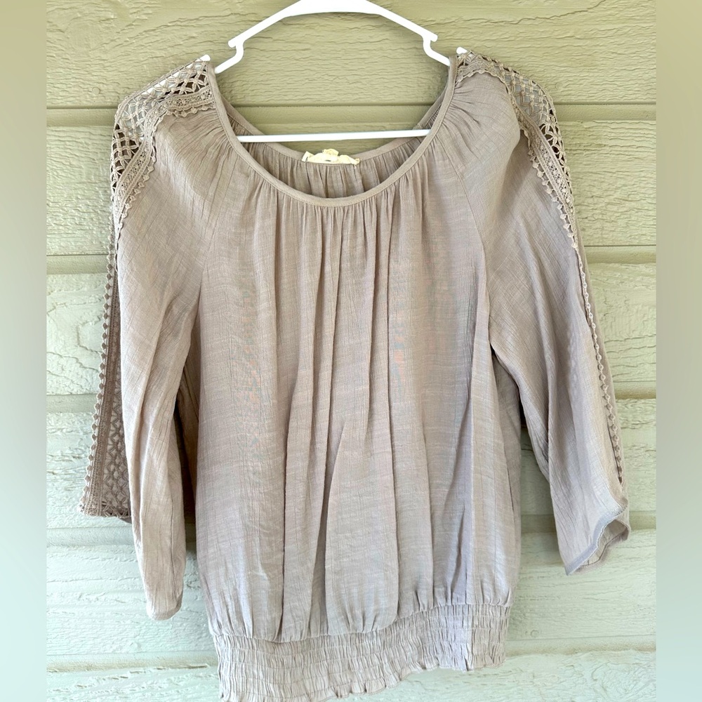 Lace sleeves brown color fitted bottom size S . Never worn